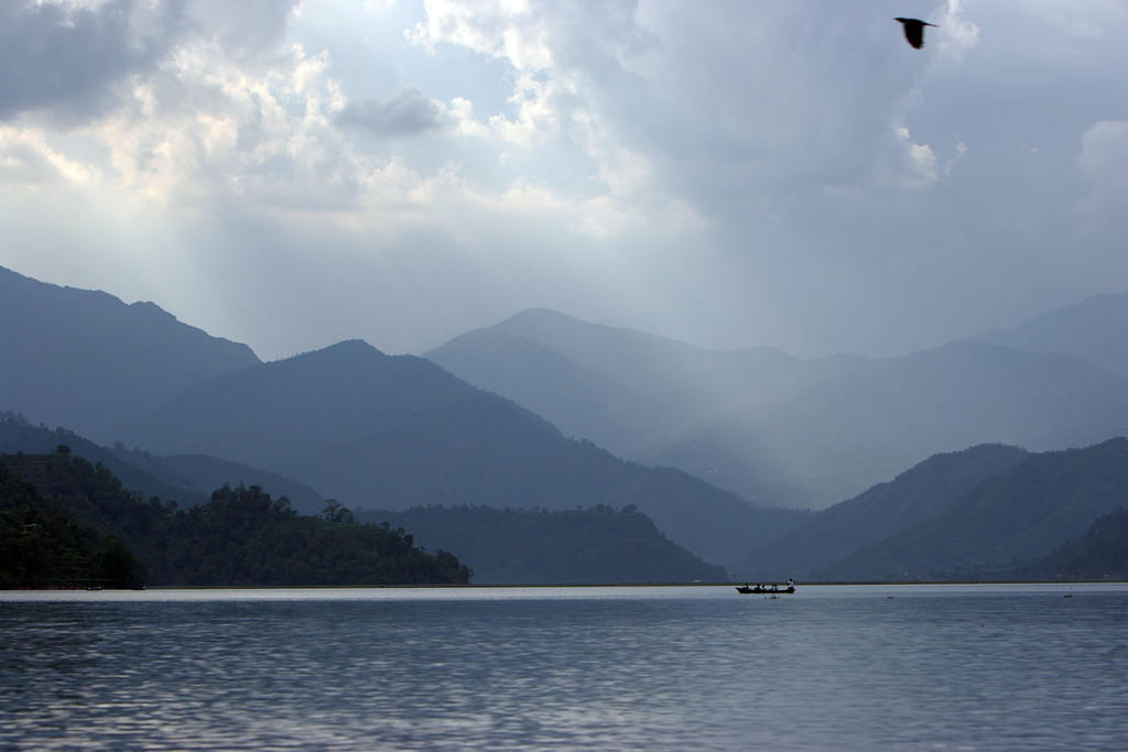 Cloudy dusk at Fewa Lake in Pokhara.