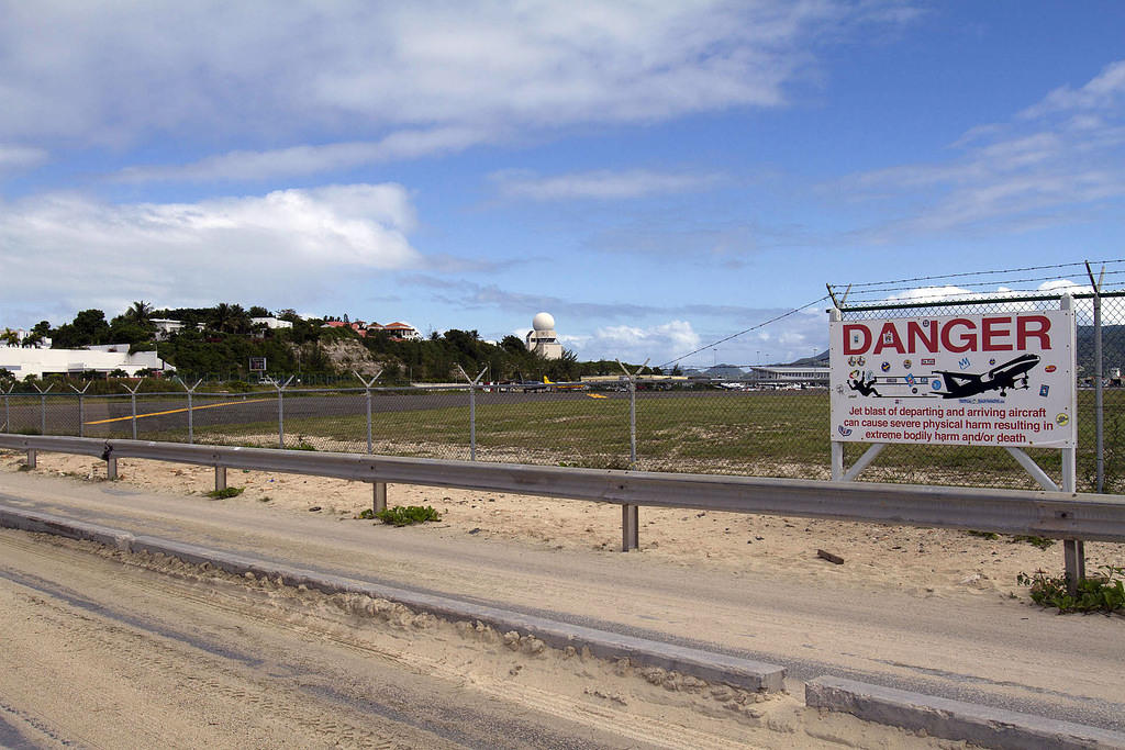 Maho Beach, Sint Maarten.  Low-flying aircraft warning