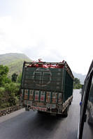 Tata truck, full of propane tanks.