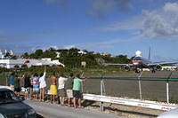 People holding on to the fence during a departure