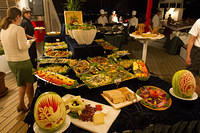 BBQ spread on the ship with whole roast pig and lobsters