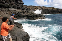 Fishing.  Sometimes we'd have to watch out for the occasional huge wave that would crash on the rocks and threaten to soak us.