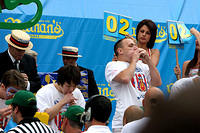 Joey jams meat down his gullet